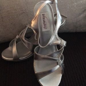 Dress sandals with 3” heels.  Silver metallic.